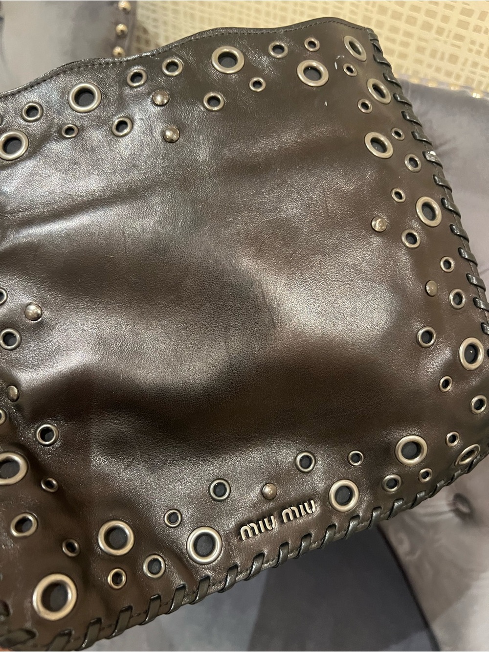 Miu Miu Black Leather Shoulder Bag with Eyelet Detailing